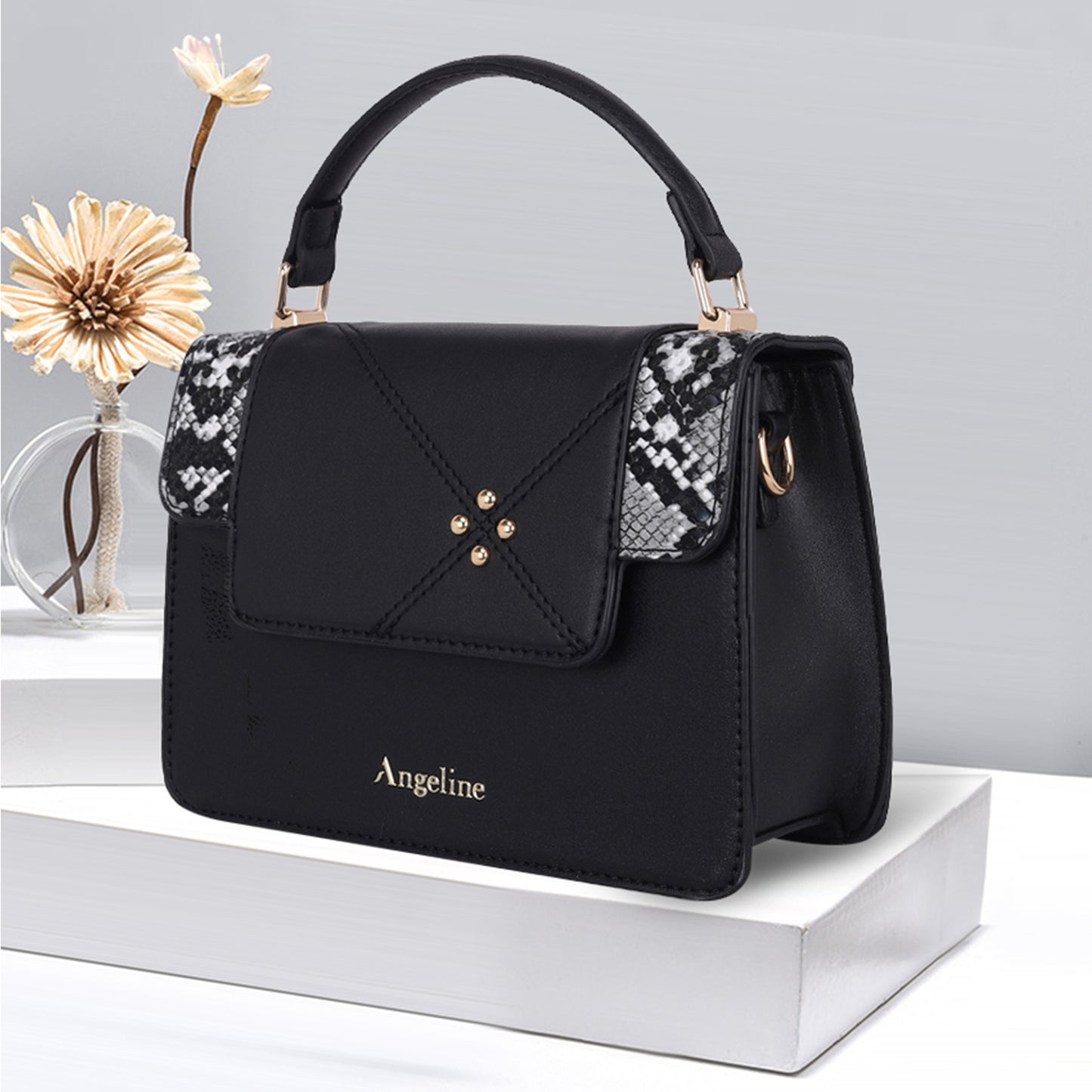 A black designer sling bag featuring a chic crocodile pattern, perfect for stylish women seeking luxury and functionality.