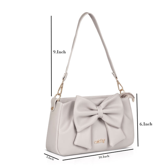 AngelineByAngie brown handbag displayed with accessories for versatile appeal.