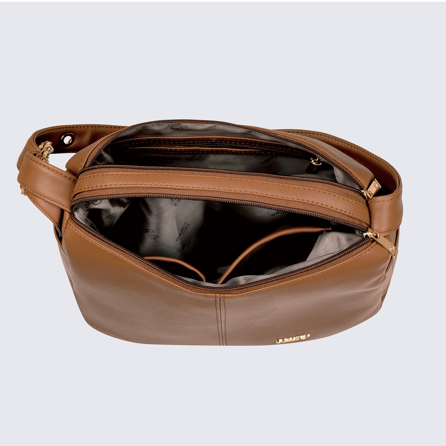 An open tan leather handbag, showing the interior lining and pockets.