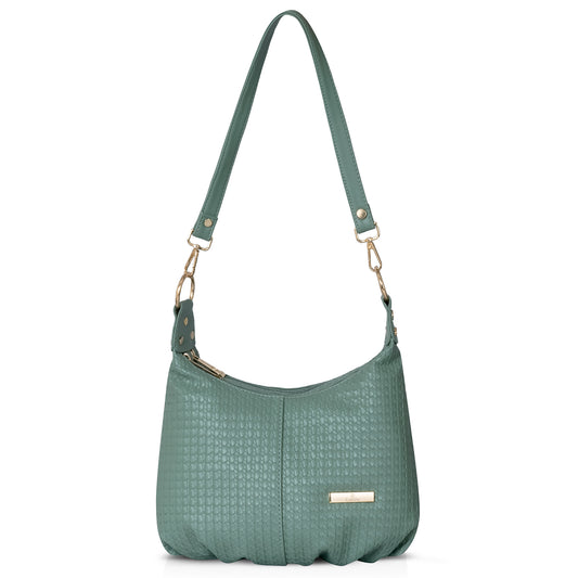 Stylish black textured bag with gold chain on neutral backdrop.