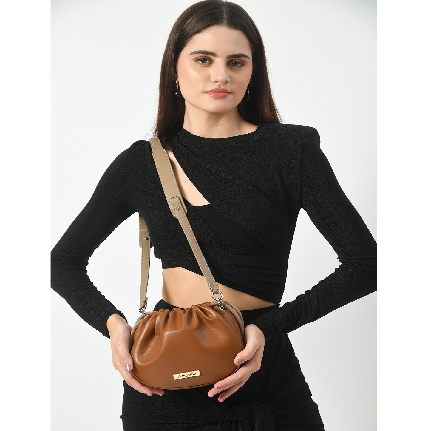 Sling bag with multiple pockets, perfect for evening strolls.