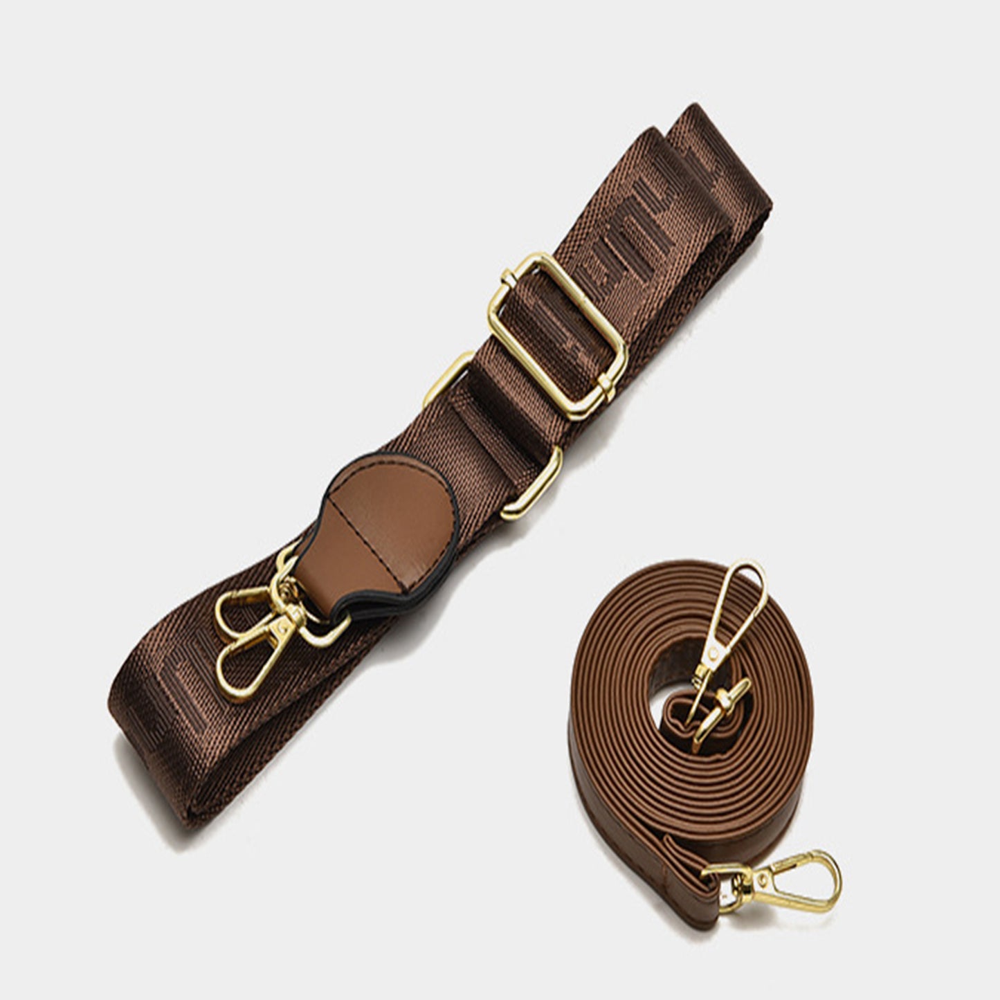 Tan brown PU leather structured sling bag strap, paired with a coiled brown leather strap.
