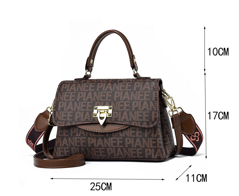 Brown magnet sling bag, perfect size for a sophisticated on-the-go look.