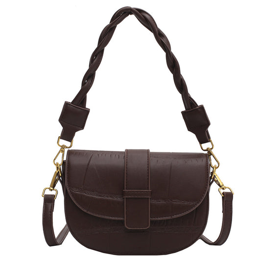 Round shape Women Sling Bag in black leather on white background