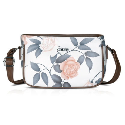 Stylish green sling bag with floral accents, crafted for modern women.