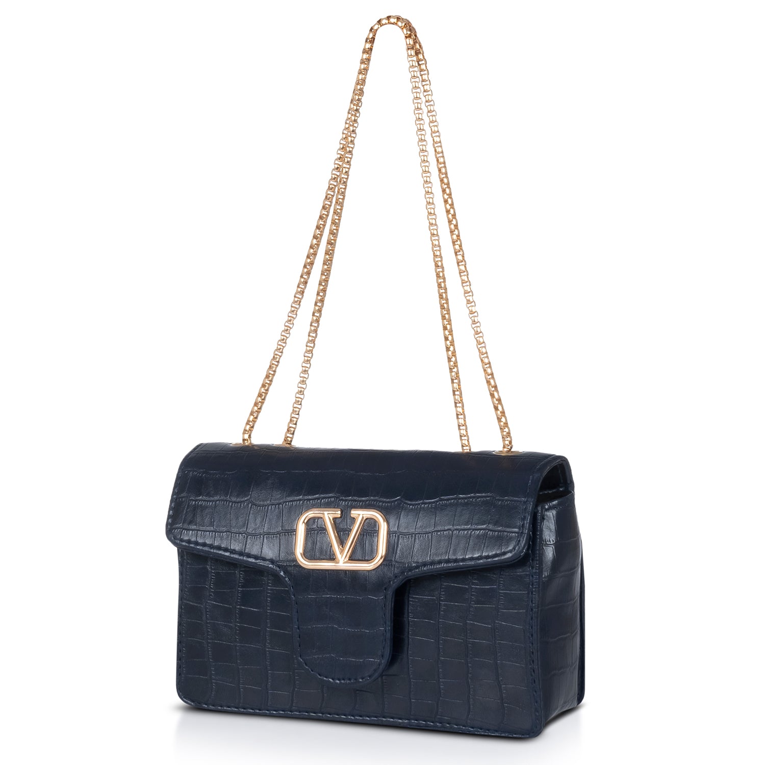 Black crocodile-embossed handbag on a velvet cushion, emphasizing its premium and luxurious feel.