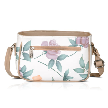 Green floral sling bag with long handle for comfortable crossbody wear.