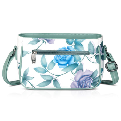 Chic green sling bag with floral print and spacious compartments for essentials.