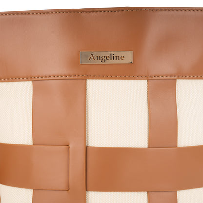 Close-up of Angeline logo on brown leather patch of cream and brown checked canvas tote bag