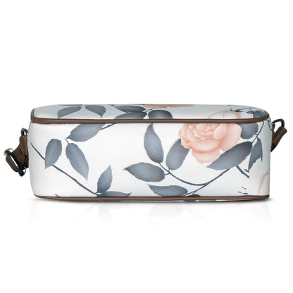 Green floral sling bag with adjustable strap, perfect for on-the-go style.