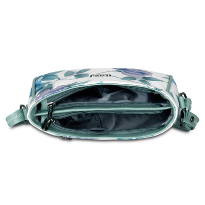 Stylish green floral sling bag with multiple pockets for organized travel.