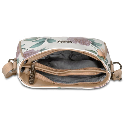 Classy green sling bag with floral design, crafted for everyday elegance.