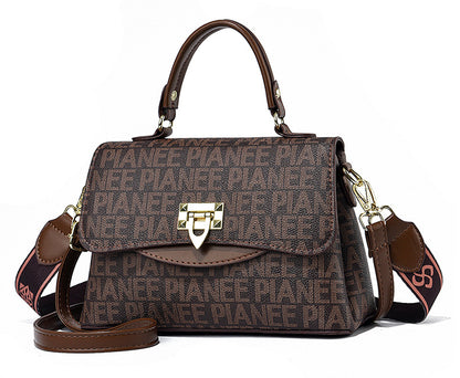 Sling bag leather brown, highlighting a chic magnet closure detail.