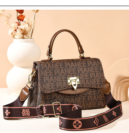 Sling bag leather brown, showcasing a stylish magnet closure feature.