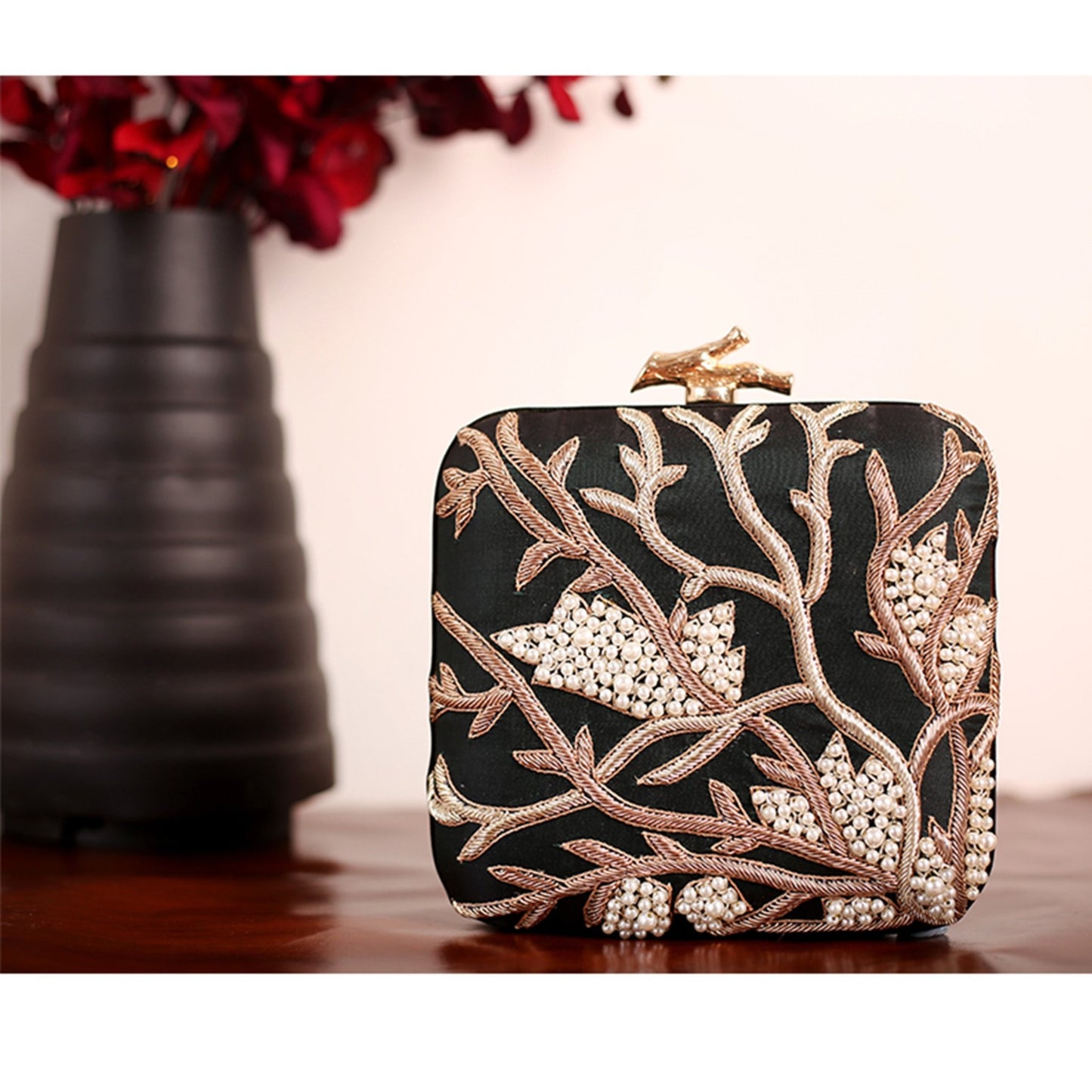 Angeline's Handcrafted Clutch Bag with Root design